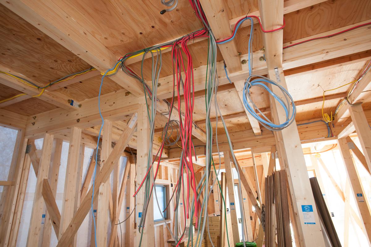 How to feed wire through multiple floor joists without cutting